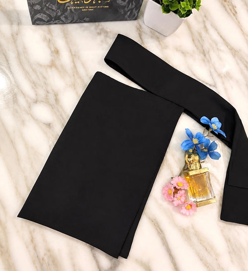 The Tie Niqab folded flat, black single-layer with tie straps